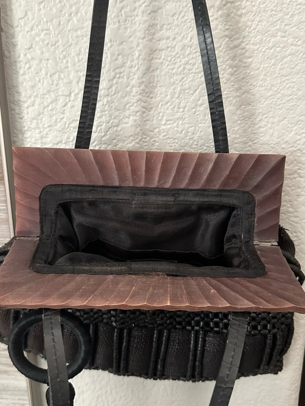 Aranaz Antik Batik tote features a wooden frame woven beaded detail and tassel